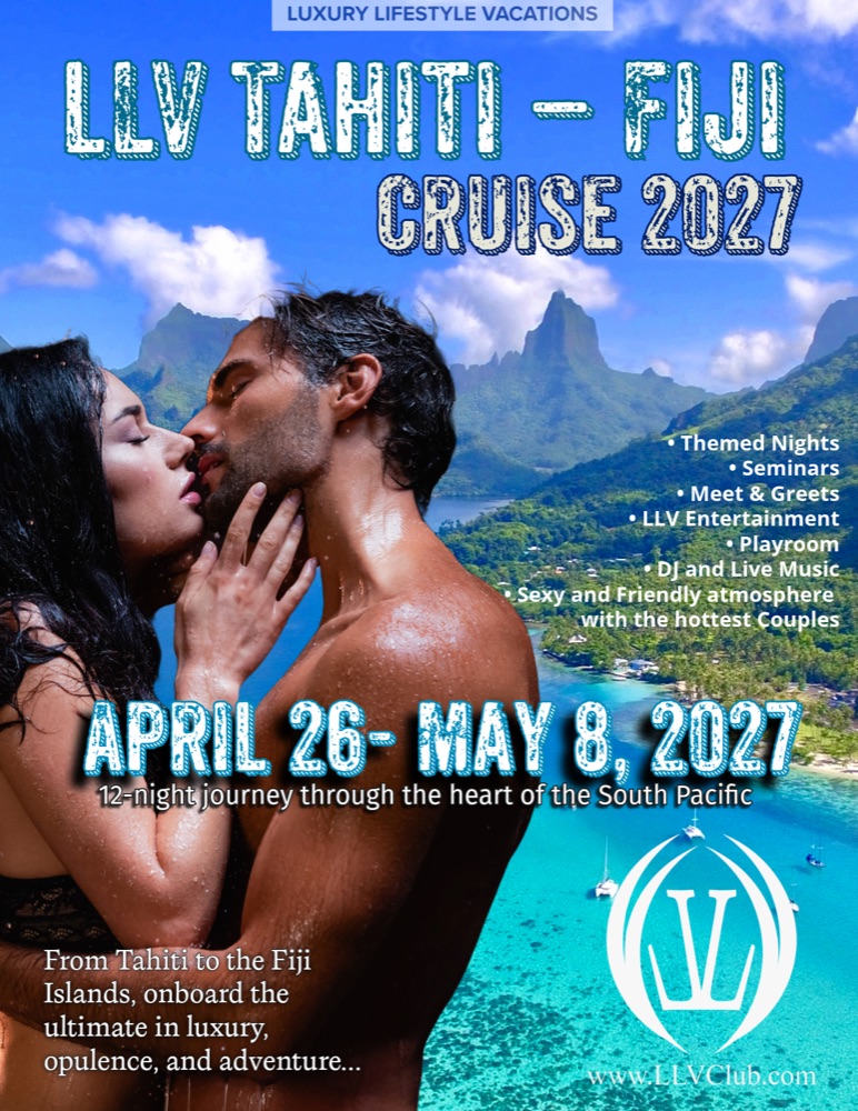 A couple with the green peaks and lagoon of the South Pacific